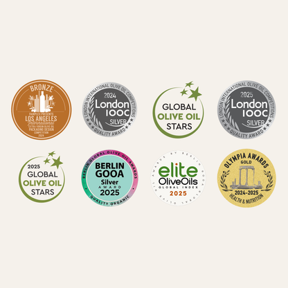 Collection of 7 Elies olive oil awards on a light background