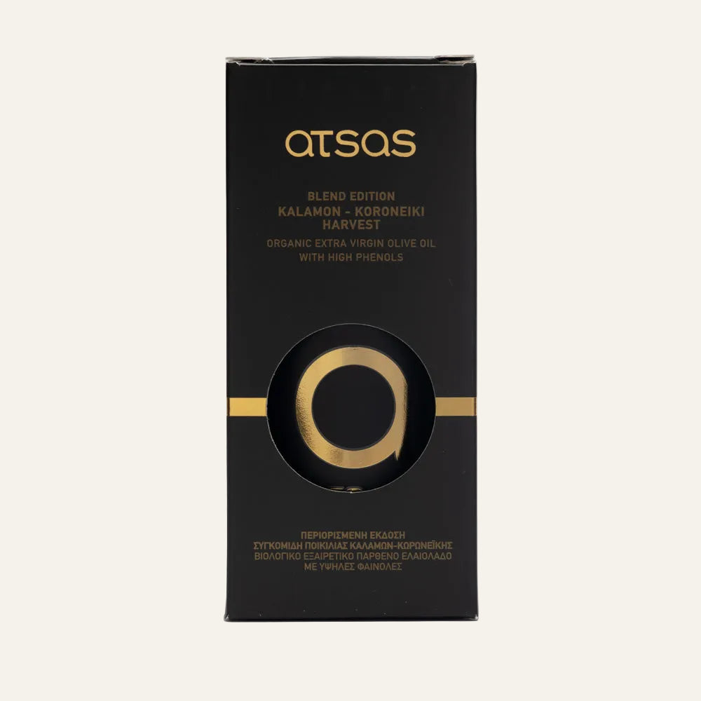 Black and gold packaging of ATSAS olive oil on a white background