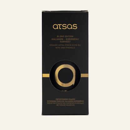 Black and gold packaging of ATSAS olive oil on a white background