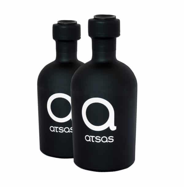 A set of two bottles Atsas oil